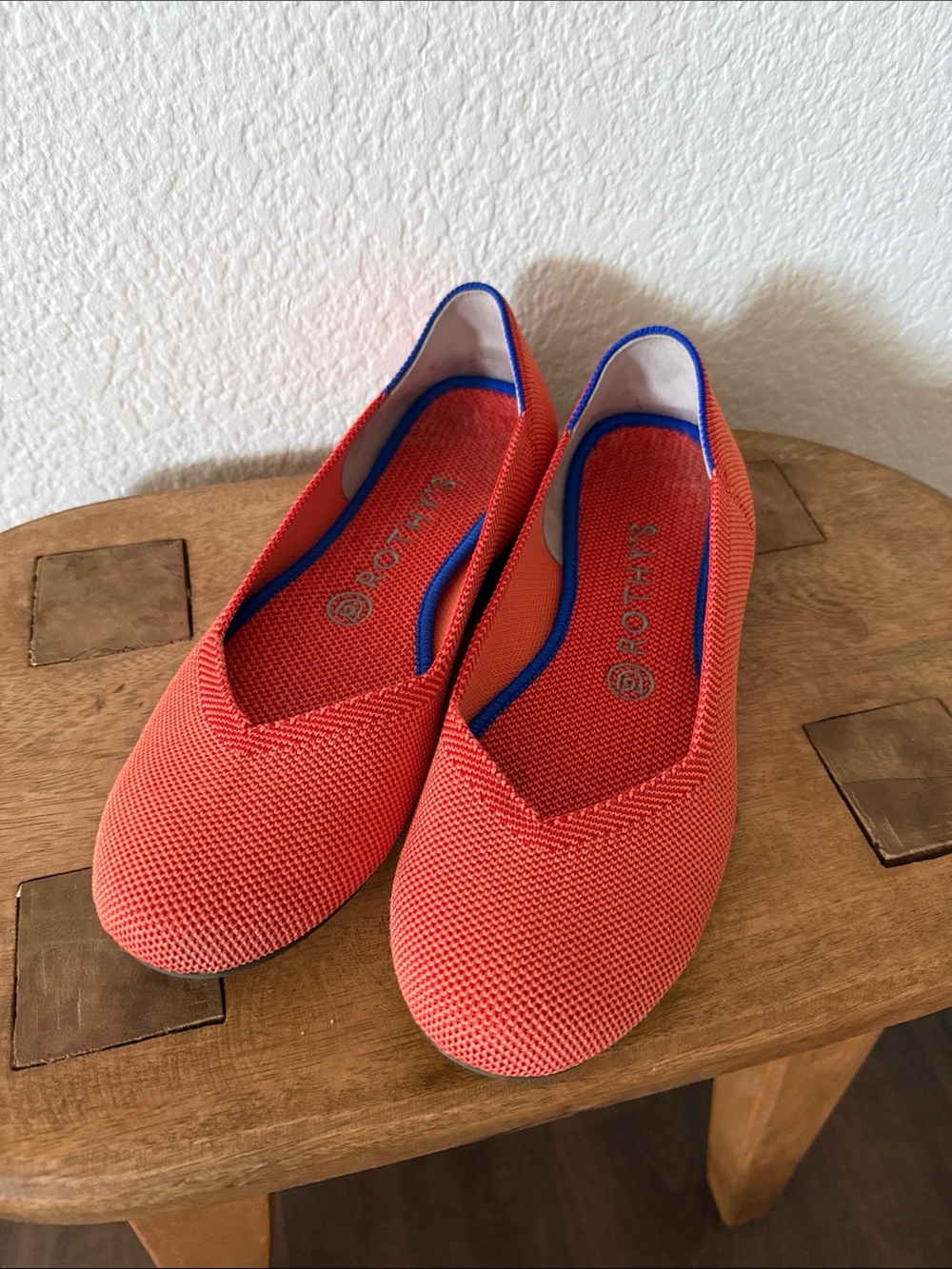 Rothy's Persimmon Orange Women’s Round Toe Ballet Flats with Blue Heel Stripe